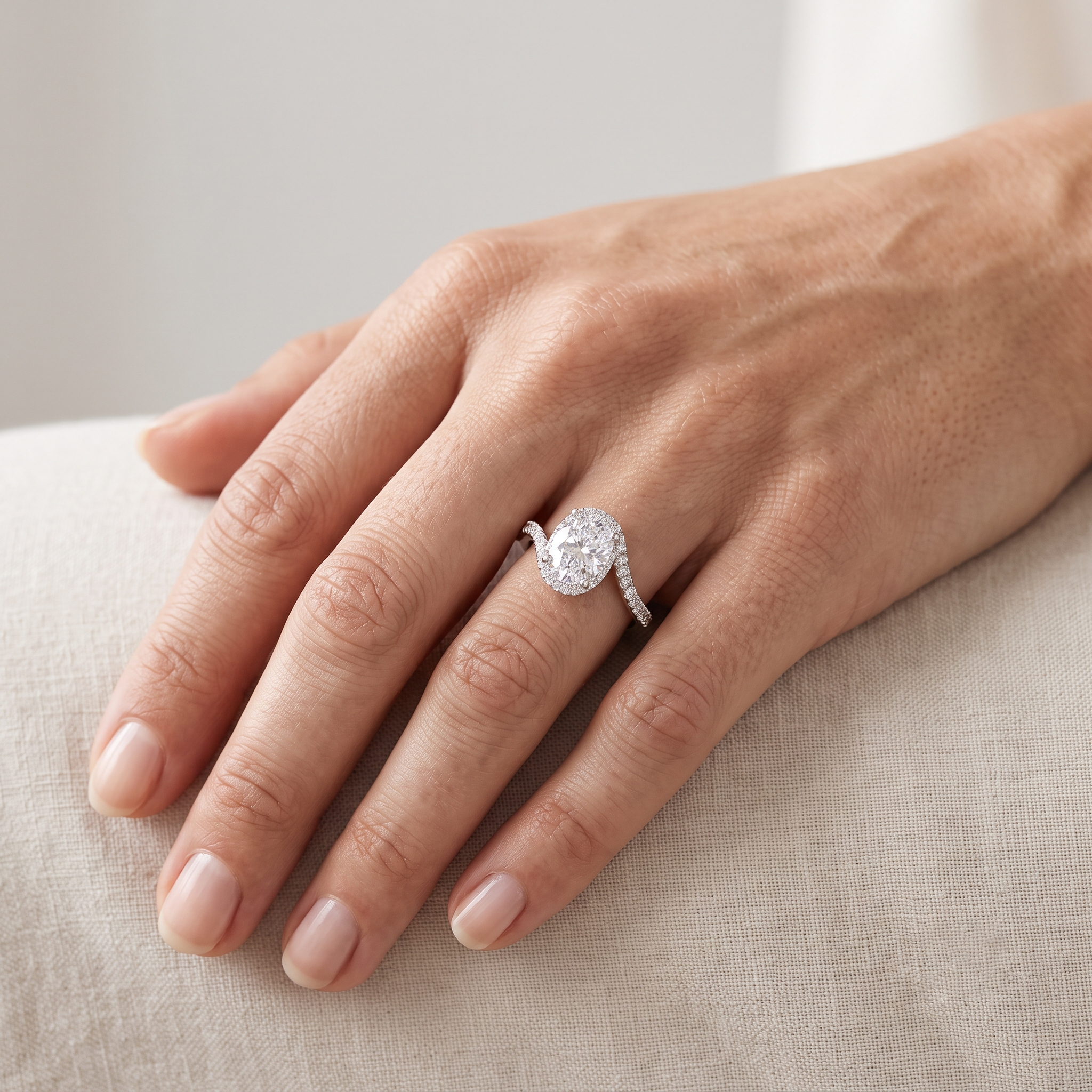 The Sovereign Oval-Cut Bypass Halo Engagement Ring in Sterling Silver