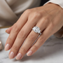 Three-Stone Trilogy Engagement Ring with Emerald-Cut Center Stone