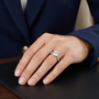 Sterling Silver Round-cut Moissanite Solitaire Engagement Ring with Distinctive Twisted Band