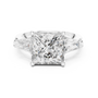 A Three-Stone Princess-Cut Engagement Ring with Tapered Baguette Accents