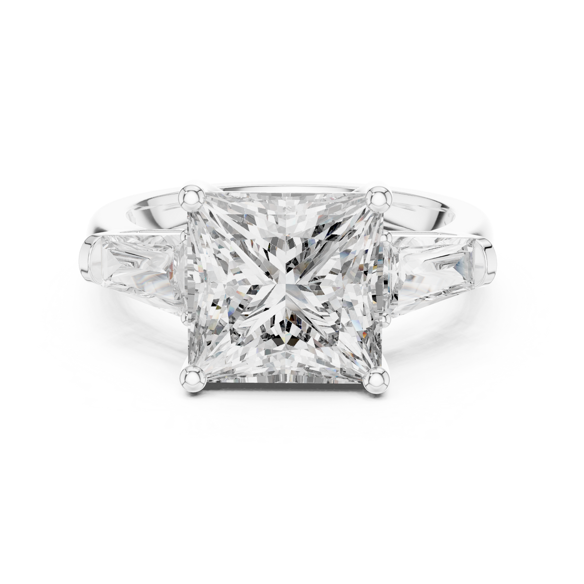 A Three-Stone Princess-Cut Engagement Ring with Tapered Baguette Accents