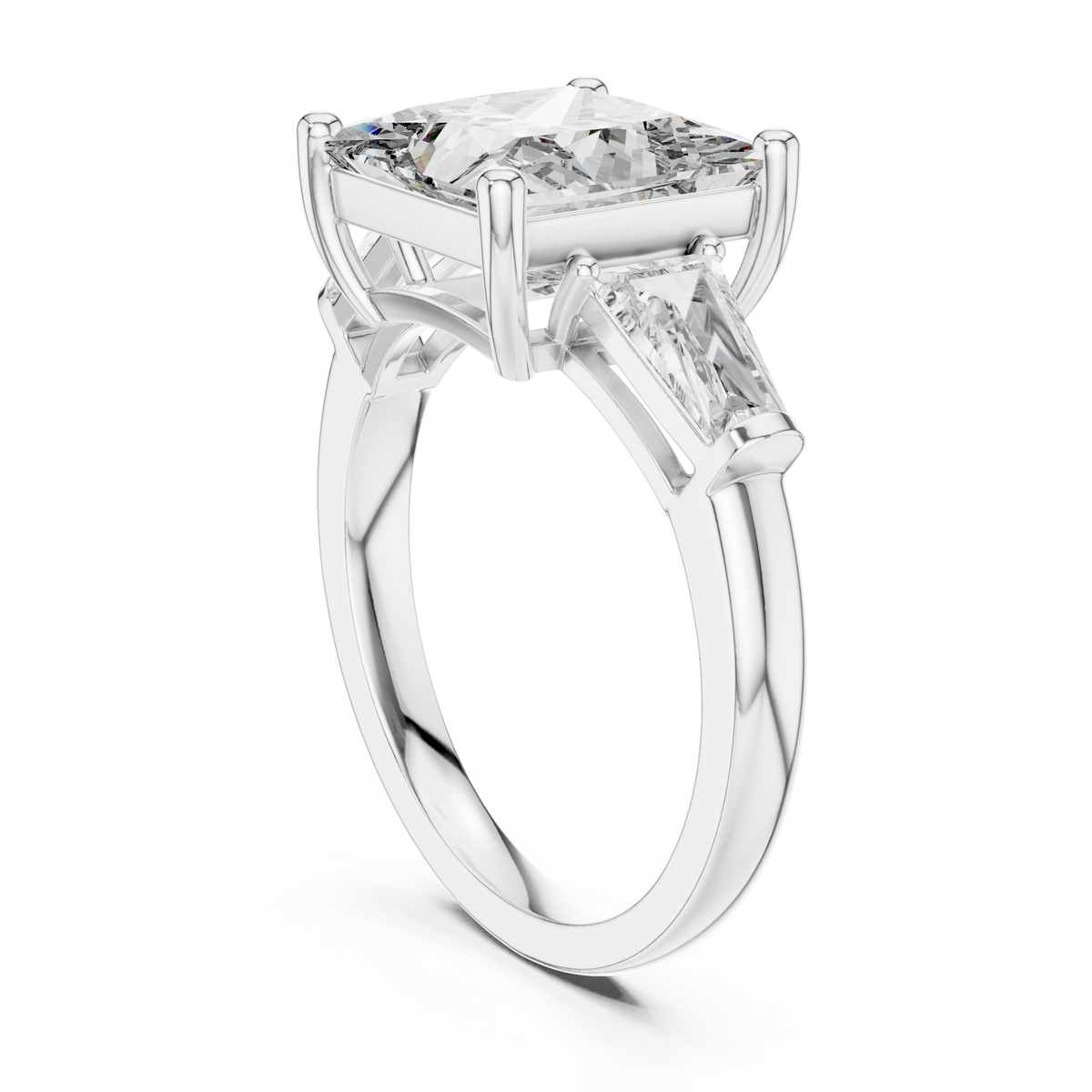 A Three-Stone Princess-Cut Engagement Ring with Tapered Baguette Accents