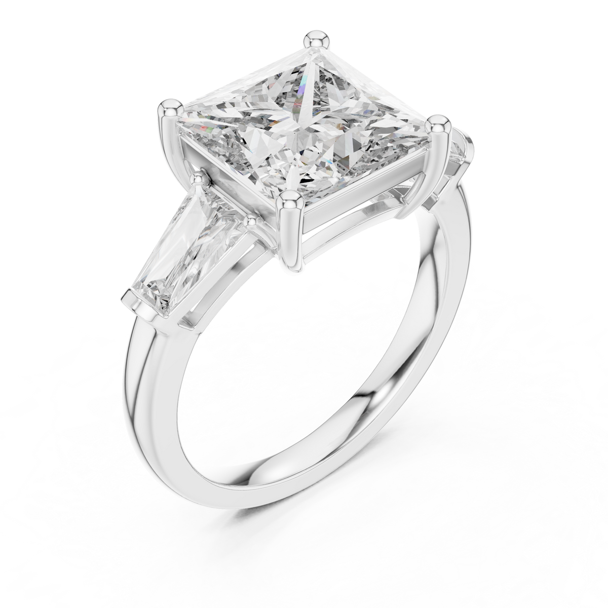 A Three-Stone Princess-Cut Engagement Ring with Tapered Baguette Accents