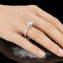 Classic Round Moissanite Four-prong Solitaire Sterling Silver Engagement Ring