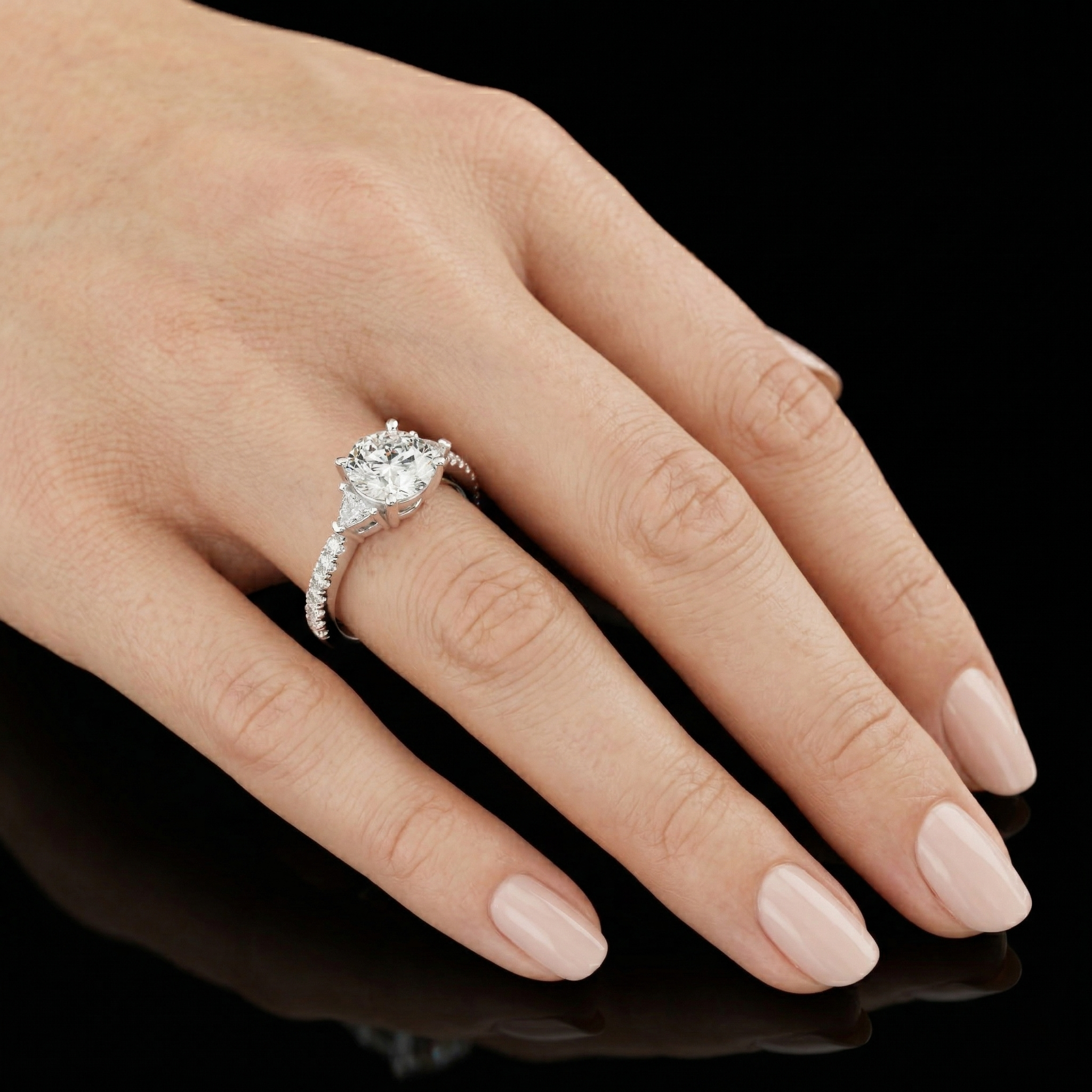 Three-stone Round Cut Center Moissanite with Triangular Side Stones Engagement Ring