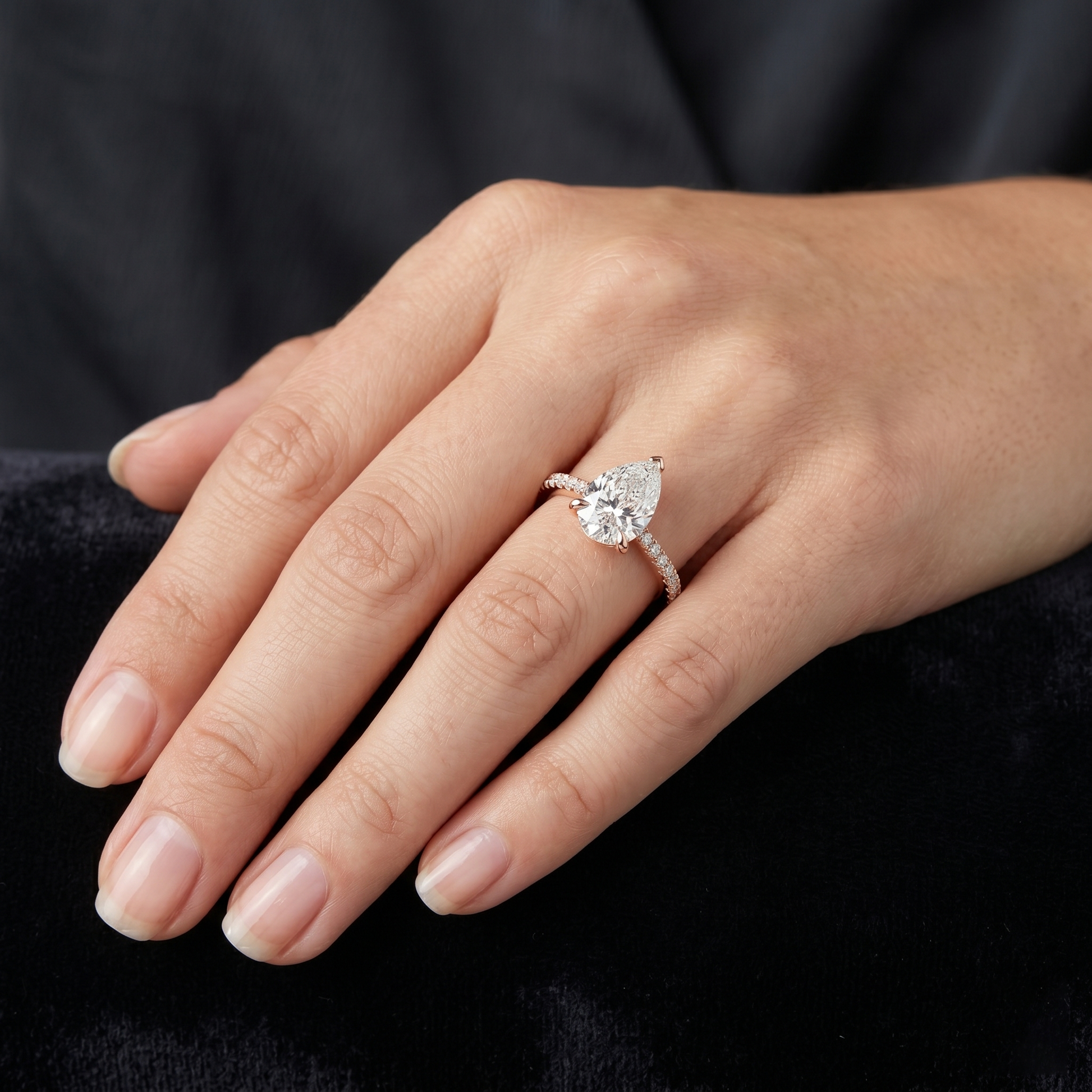 2.28 TCW Pear-shaped Solitaire Lab Grown Engagement Ring Featuring a Delicate Pave Band