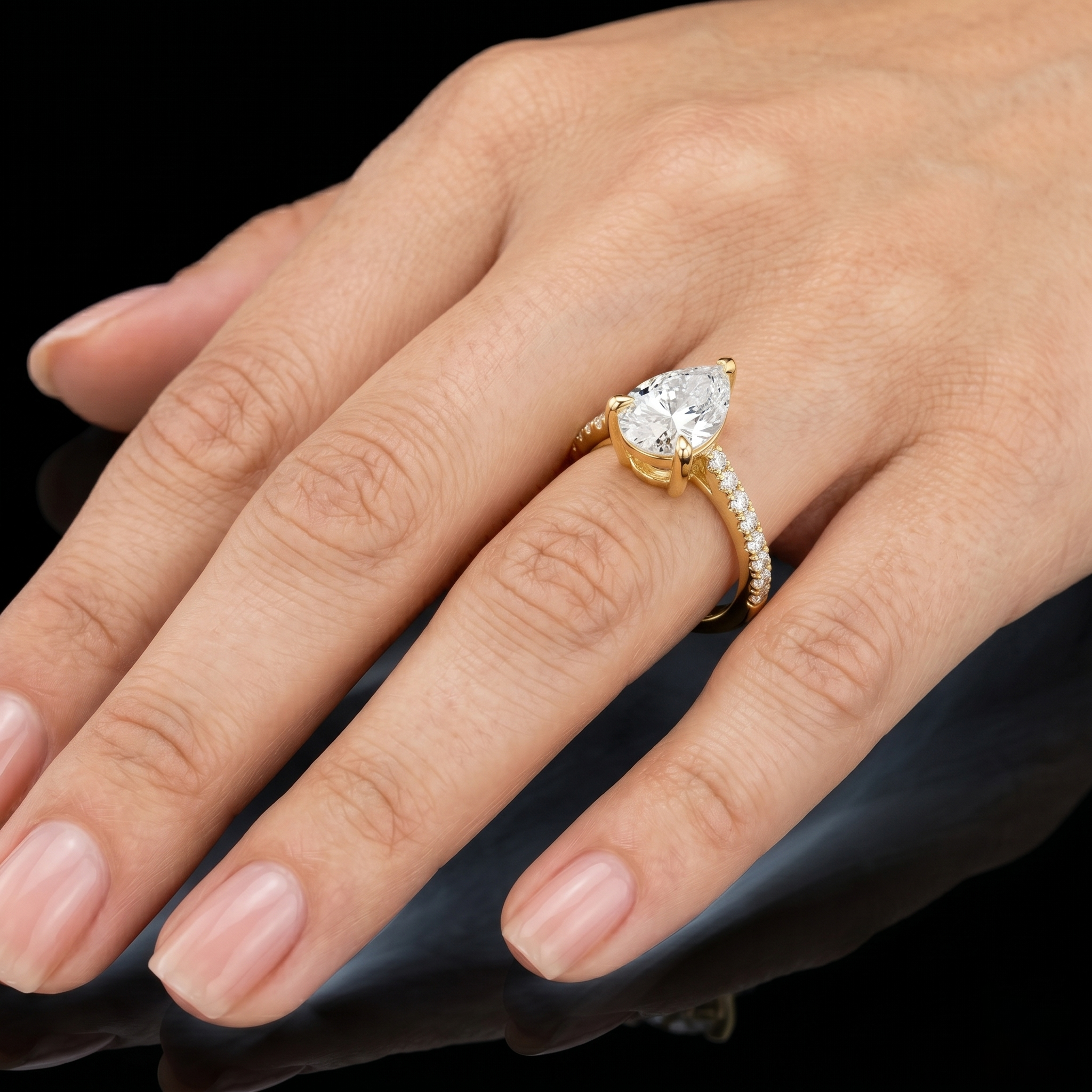 2.28 TCW Pear-shaped Solitaire Lab Grown Engagement Ring Featuring a Delicate Pave Band