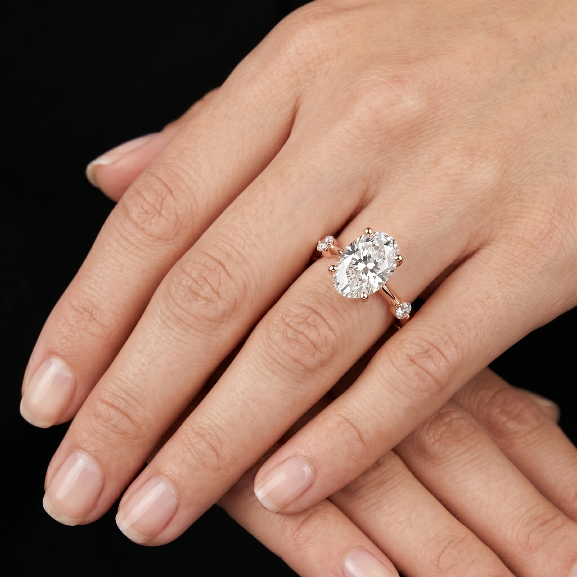 2.24 TCW Oval-cut Lab Grown Solitaire Engagement Ring with Raindrop Style Side Accent Stones