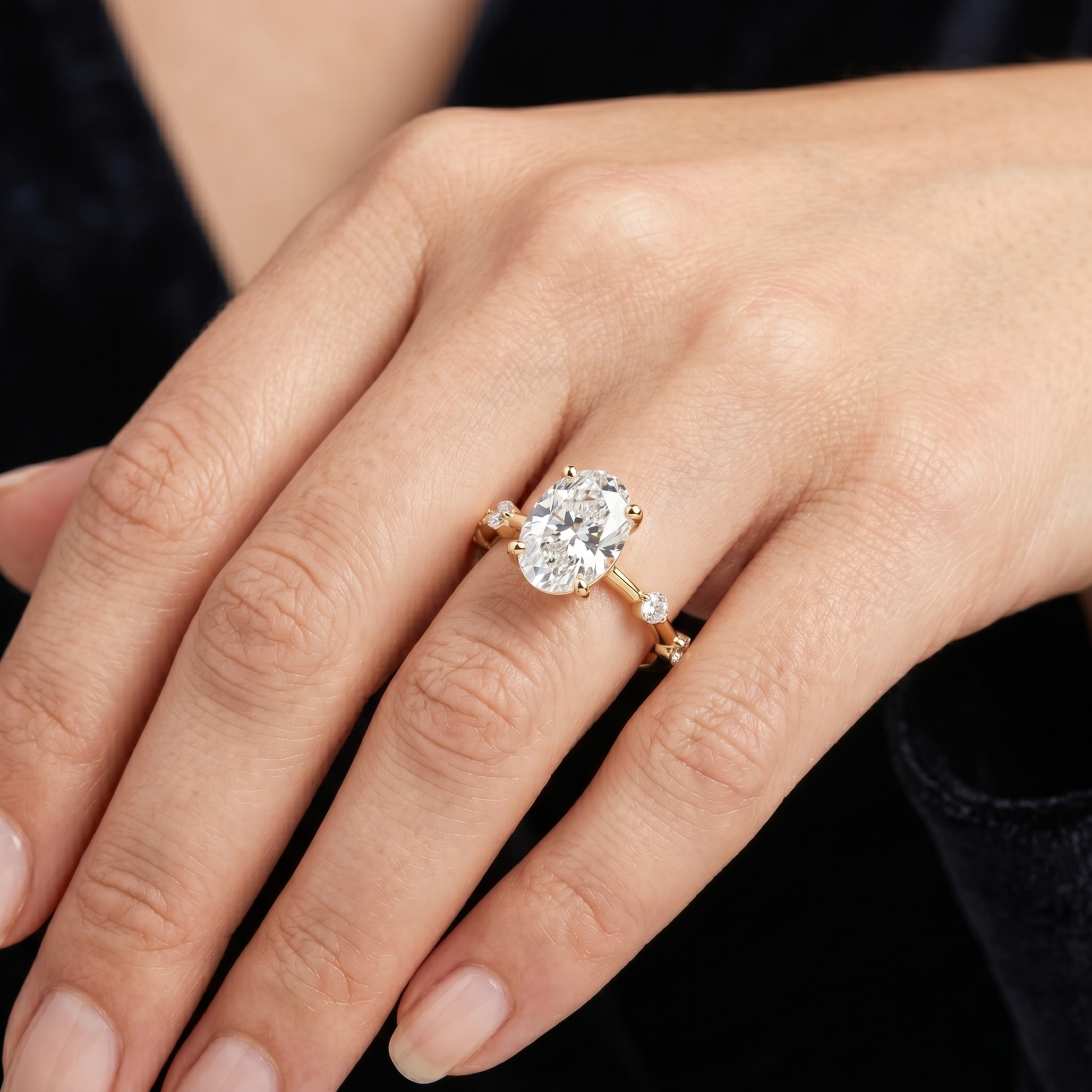 2.24 TCW Oval-cut Lab Grown Solitaire Engagement Ring with Raindrop Style Side Accent Stones