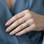 Oval-cut Moissanite Solitaire Engagement Ring with Raindrop Style Side Accent Stones