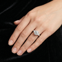 Round Cut Moissanite Women's Engagement Ring with Side Accent Stones