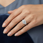 Central Round Cut Moissanite Sterling Silver Engagement Ring with Side Stone