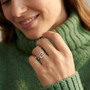 Minimalist Spiral Silver Ring with Open-Wrap Design and Bezel-Set Moissanites