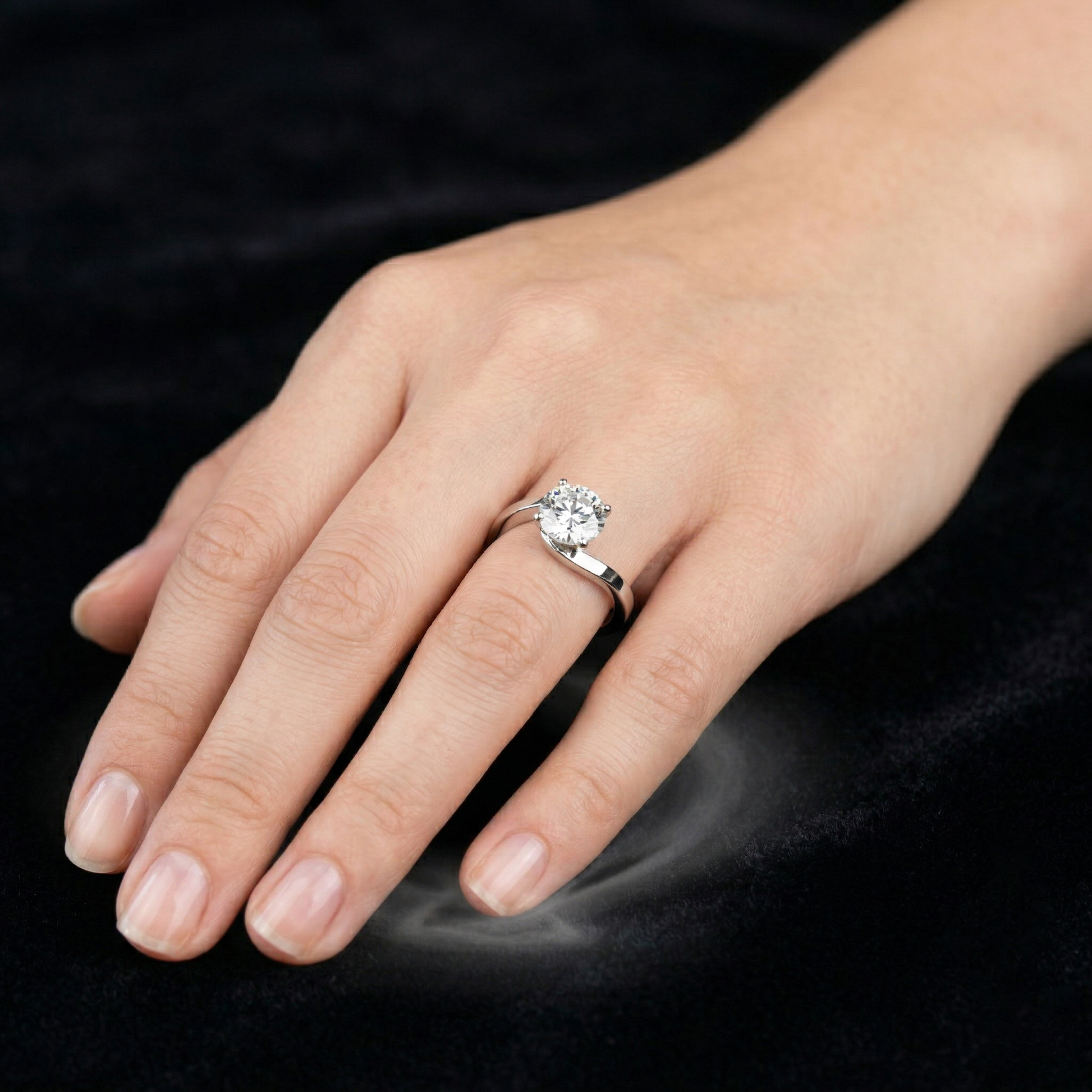 Round Moissanite Silver Solitaire Engagement Ring with a Swirl Band Design