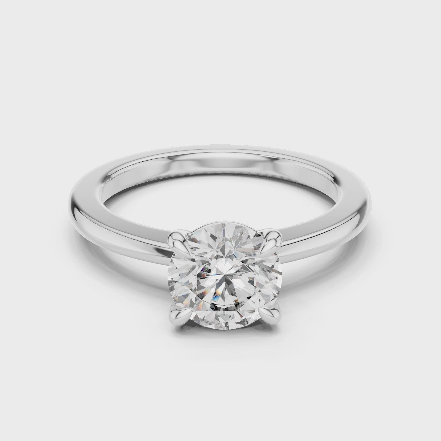 Classic Round Moissanite Four-prong Solitaire Sterling Silver Engagement Ring