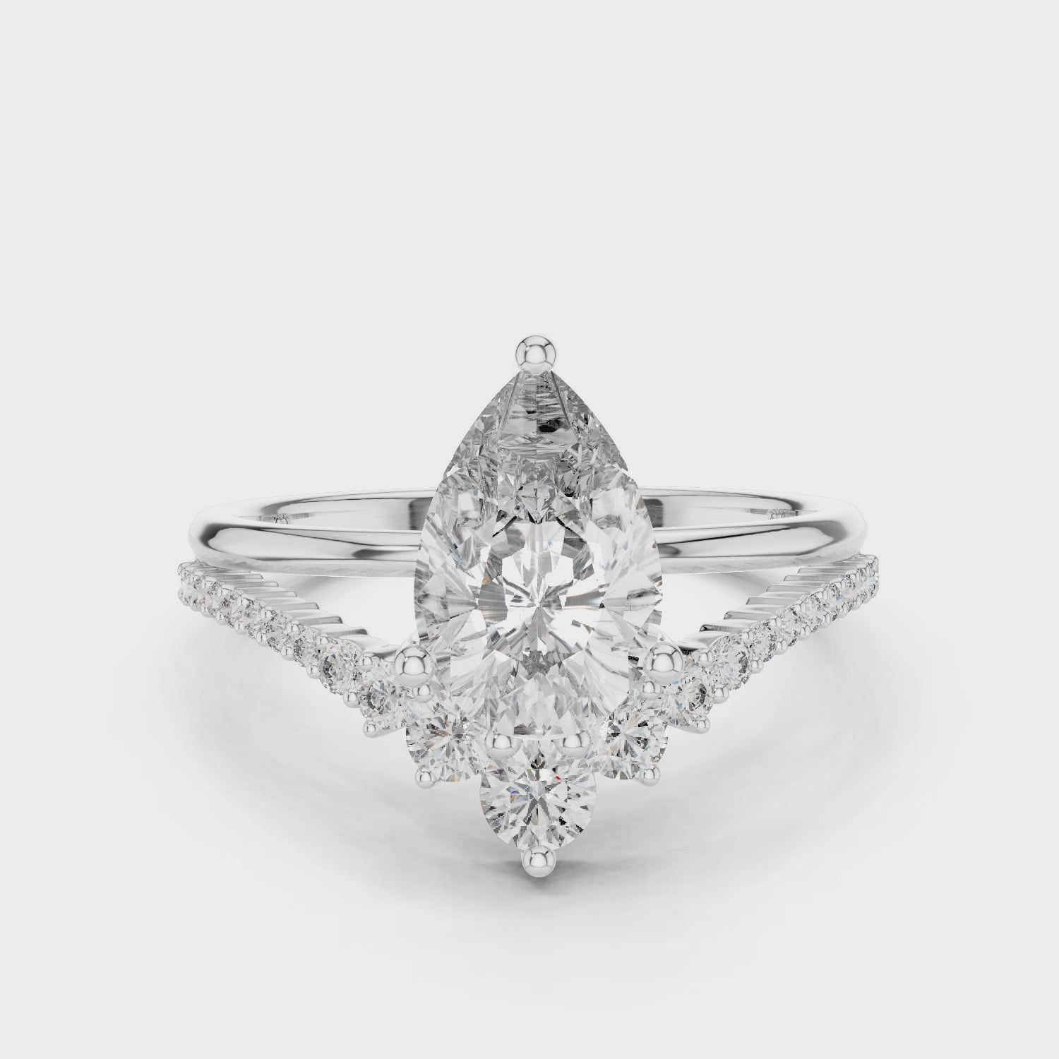 Central Pear-shaped Moissanite with a Pave Diamond Crown Split Shank Engagement Ring