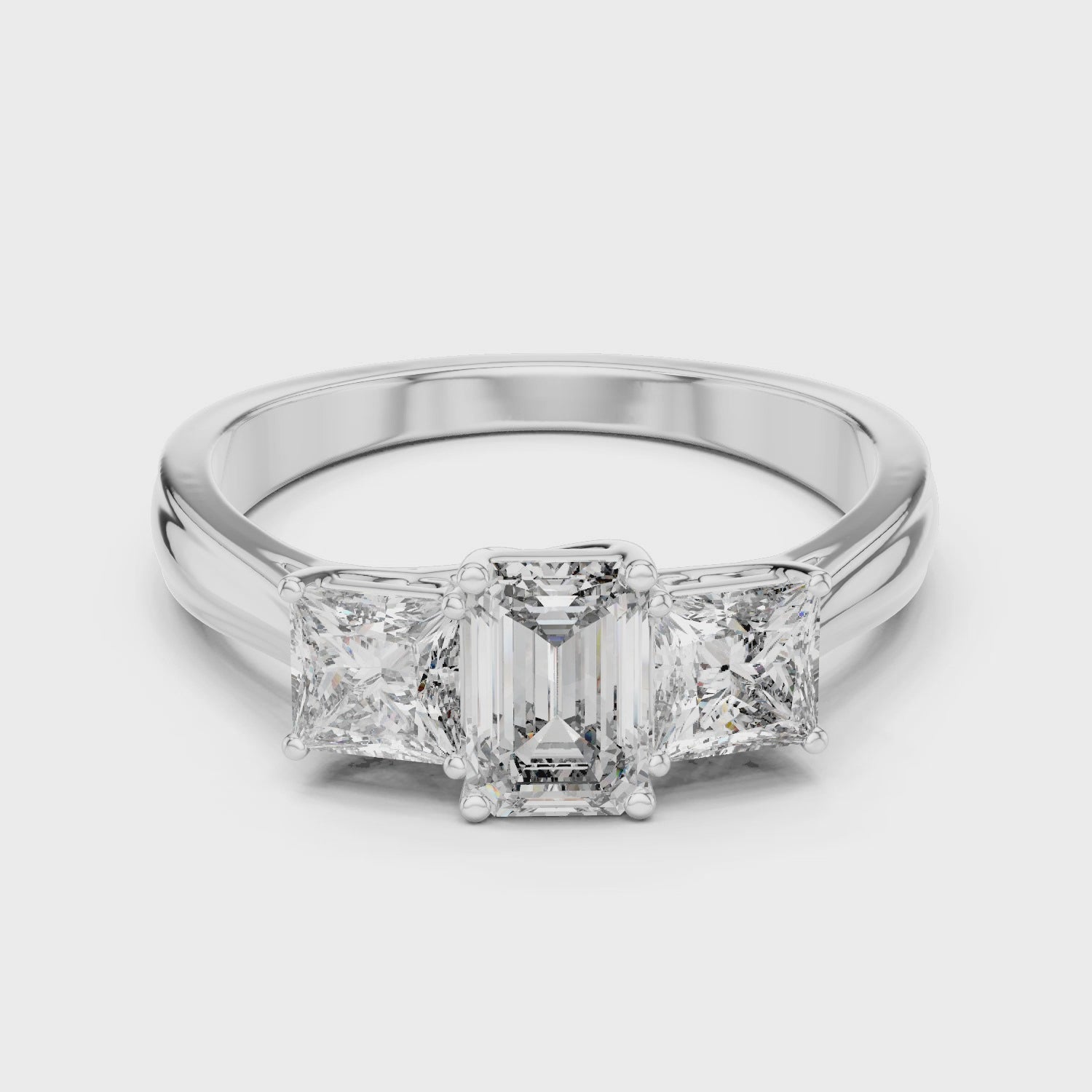 Emerald and Princess Cut Moissanite Trilogy Engagement Ring in Sterling Silver