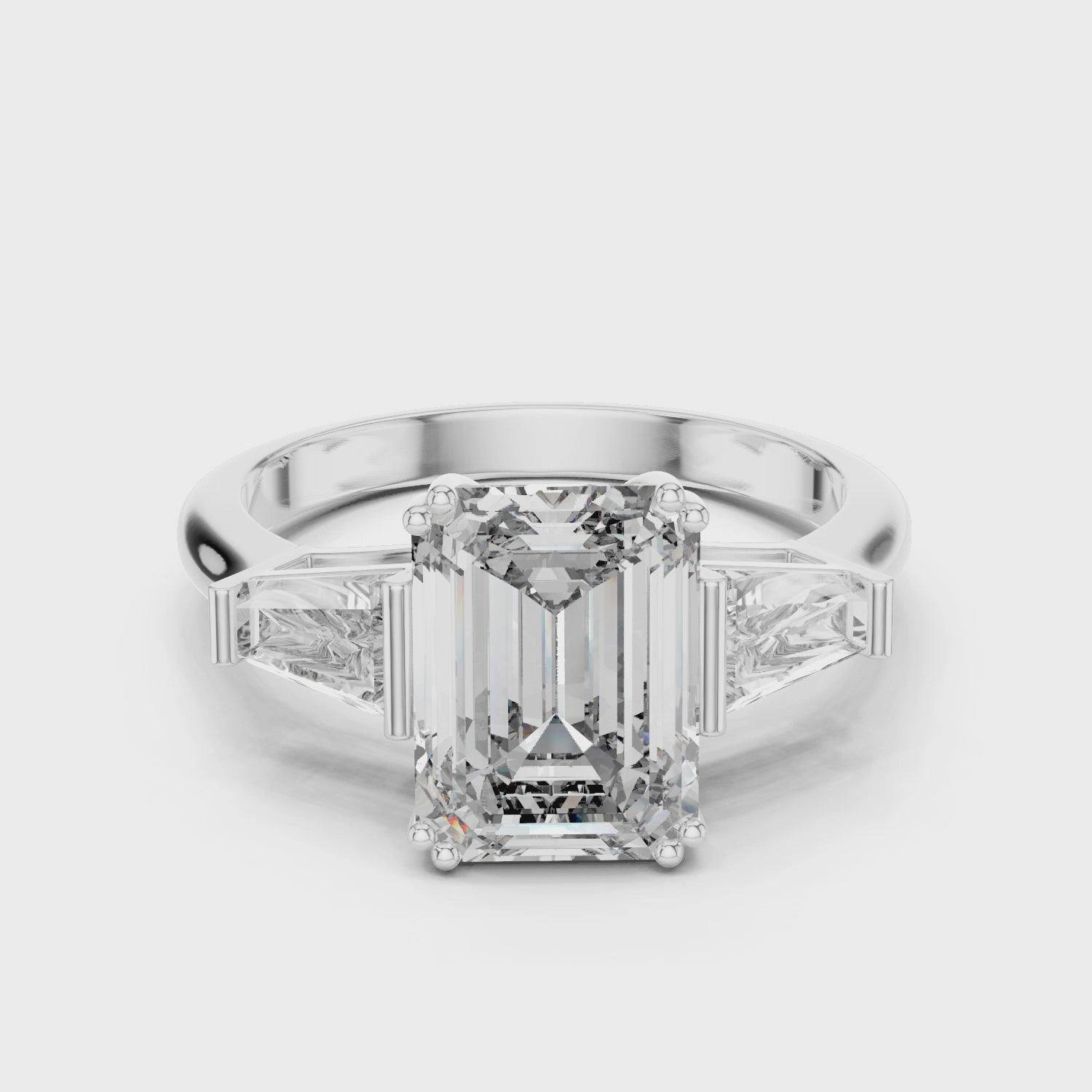 Sterling Silver Emerald-Cut Moissanite Engagement Ring with Tapered Baguette Side Stones